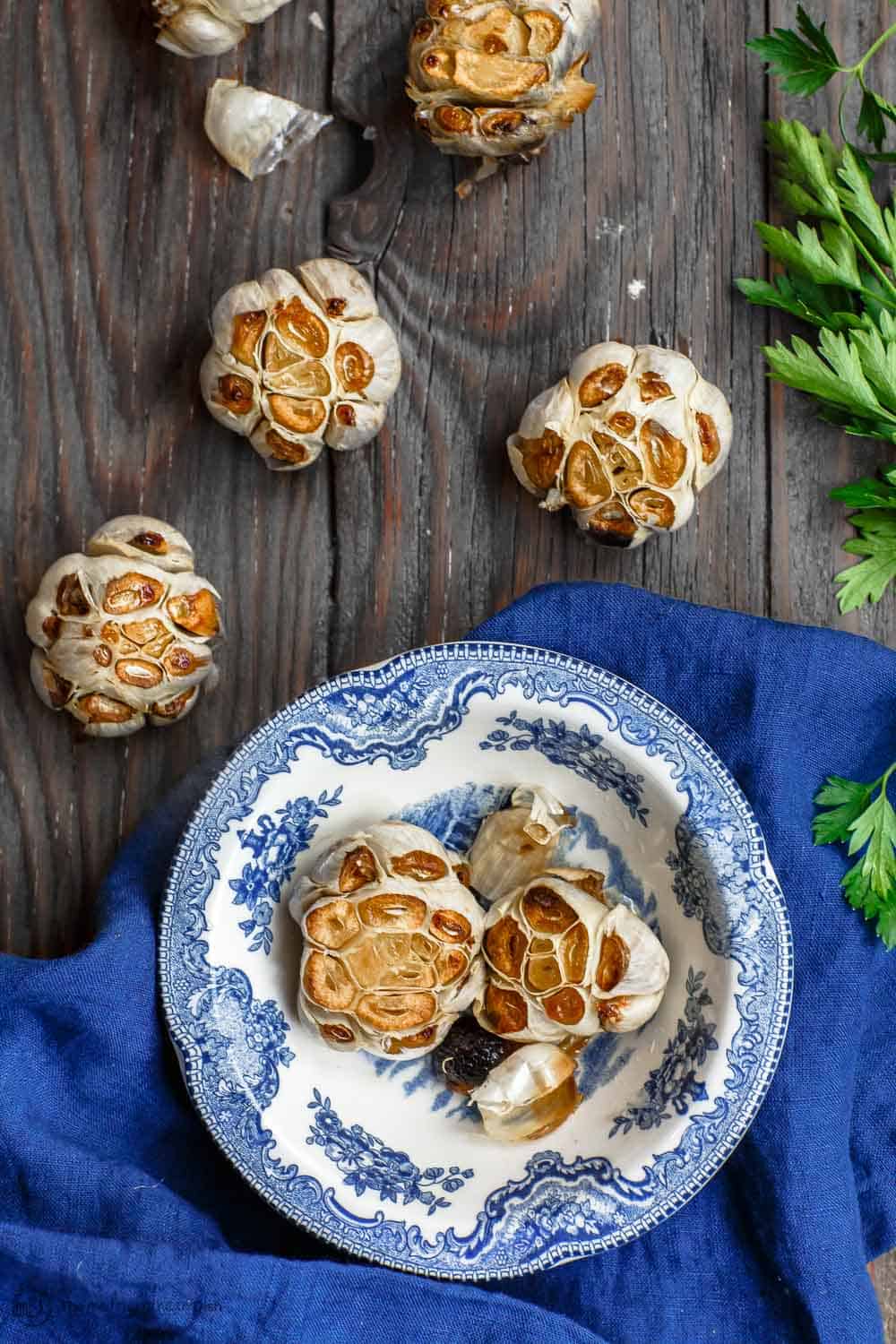 Fresh roasted garlic heads ready to be stored or served