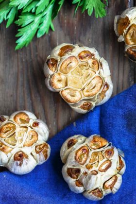How to Roast Garlic and How to Store It | The Mediterranean Dish. Learn a few simple ways to roast garlic and to store your roasted garlic for daily use. These roasted garlic recipes are foolproof and give you the best soft, caramelized, and smoky roasted garlic. Plus get our recipes using roasted garlic. from themediterraneandish.com #garlic #roastedgarlic #mediterraneandiet #greekrecipes #italianrecipes #greekfood #italianfood #mediterraneanrecipes