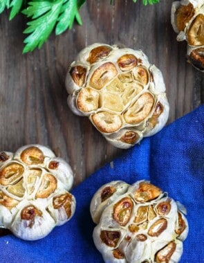 How to Roast Garlic and How to Store It | The Mediterranean Dish. Learn a few simple ways to roast garlic and to store your roasted garlic for daily use. These roasted garlic recipes are foolproof and give you the best soft, caramelized, and smoky roasted garlic. Plus get our recipes using roasted garlic. from themediterraneandish.com #garlic #roastedgarlic #mediterraneandiet #greekrecipes #italianrecipes #greekfood #italianfood #mediterraneanrecipes