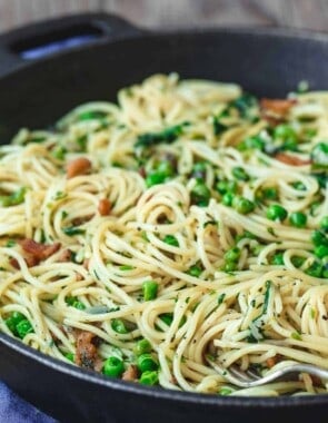 pancetta pasta with peas in a cast iron skillet