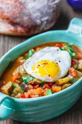 Easy Ratatouille Recipe | The Mediterranean Dish. A simple, hearty, and flavor packed ratatouille made in just one pot. Recipe comes with tips for best ratatouille, how to serve ratatouille and more. The perfect weeknight meal from themediterraneandish.com. #ratatouille #easyrecipe #mediterraneandiet #mediterraneanrecipe #vegan #veganrecipes #vegetarian #vegetarianrecipes #stew #zucchinirecipes #eggplantrecipes #glutenfree #glutenfreerecipes