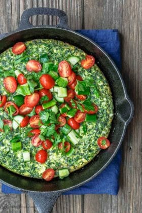 Feta and Spinach Frittata Recipe | The Mediterranean Dish. Easy, flavor-packed fritta with feta, spinach, and parsley. The perfect breakfast or weeknight dinner in just 20 minutes. From TheMediterraneanDish.com #frittata #eggs #mediterraenandiet #mediterraenanfood #italianfood #spinach #feta #healthyrecipes #easyrecipes