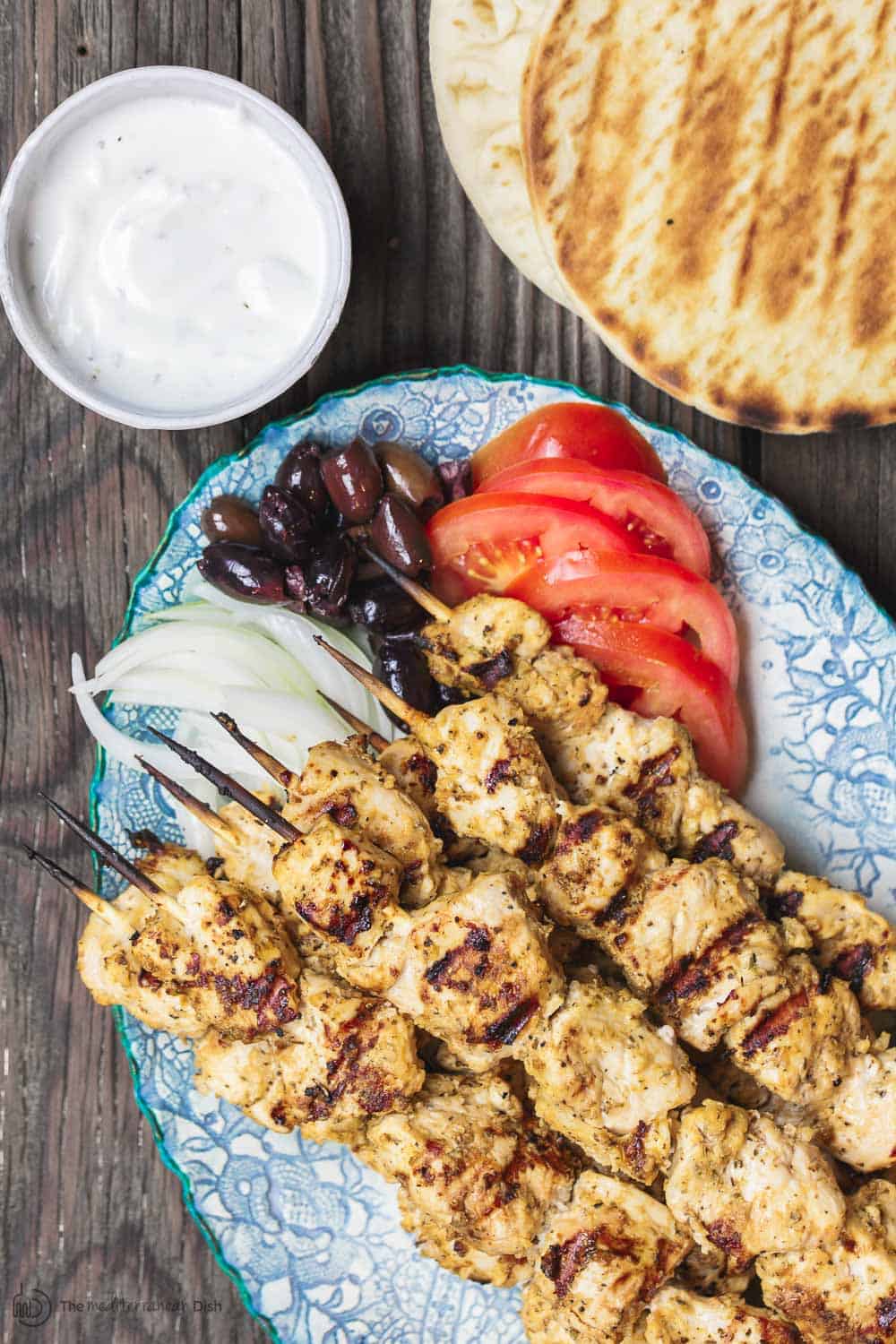 This homemade chicken souvlaki recipe takes you to the streets of Athens! Complete with the best souvlaki marinade; instructions for indoor or outdoor grilling; and what to serve with your souvlaki. Recipe from themediterraneandish.com #greekfood #souvlaki #kebab #kabob #chickensouvlaki #chickenkabob #mediterraneanfood #mediterraneandiet #mediterraneanrecipe #grilledchicken 