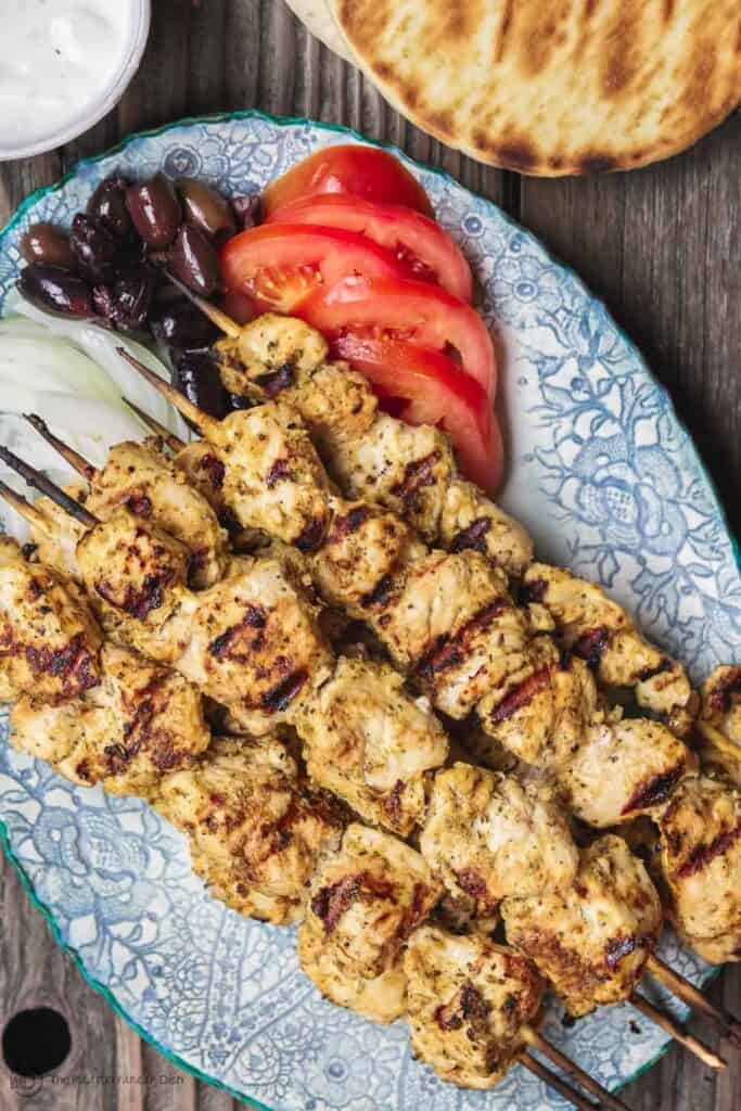 This homemade chicken souvlaki recipe takes you to the streets of Athens! Complete with the best souvlaki marinade; instructions for indoor or outdoor grilling; and what to serve with your souvlaki. Recipe from themediterraneandish.com #greekfood #souvlaki #kebab #kabob #chickensouvlaki #chickenkabob #mediterraneanfood #mediterraneandiet #mediterraneanrecipe #grilledchicken