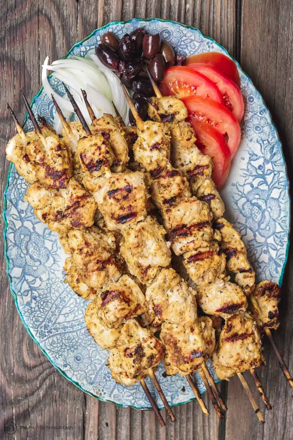 This homemade chicken souvlaki recipe takes you to the streets of Athens! Complete with the best souvlaki marinade; instructions for indoor or outdoor grilling; and what to serve with your souvlaki. Recipe from themediterraneandish.com #greekfood #souvlaki #kebab #kabob #chickensouvlaki #chickenkabob #mediterraneanfood #mediterraneandiet #mediterraneanrecipe #grilledchicken 