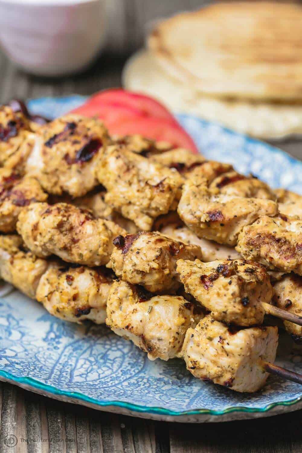 This homemade chicken souvlaki recipe takes you to the streets of Athens! Complete with the best souvlaki marinade; instructions for indoor or outdoor grilling; and what to serve with your souvlaki. Recipe from themediterraneandish.com #greekfood #souvlaki #kebab #kabob #chickensouvlaki #chickenkabob #mediterraneanfood #mediterraneandiet #mediterraneanrecipe #grilledchicken 