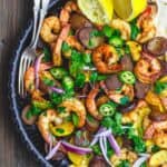 Skillet Shrimp Recipe with Chorizo and Squash | The Mediterranean Dish. Easy recipe for Spanish inspired skillet shrimp with flavors like smoked paprika and cumin. We add Spanish Chorizo and summer squash to complete the feast! Cooks in 20 minutes! From TheMediterraneanDish.com