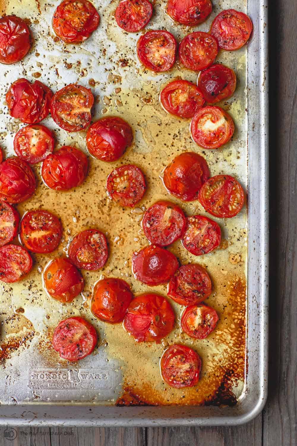 Carbonara Recipe with Roasted Tomatoes | The Mediterranean Dish. A lighter, and flavor-packed cabornara recipes with garlic roasted tomatoes and fresh herbs. You can add ribbons of prosciutto, if you like. A couple of tricks make a perfectly creamy carbonara. Recipe from themediterraneandish.com #pasta #pastarecipe #italianfood #mediterraneandiet #carbonara #easyrecipe