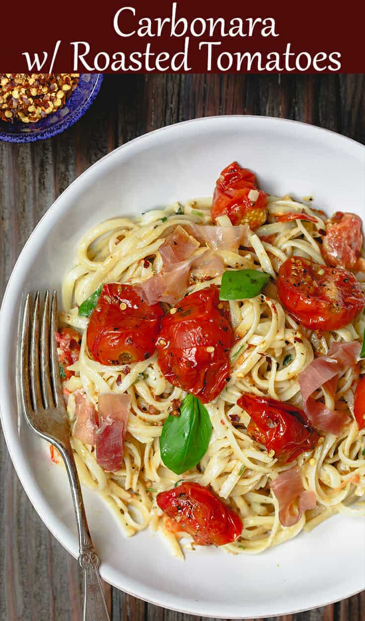 Carbonara Recipe with Roasted Tomatoes | The Mediterranean Dish. A lighter, and flavor-packed cabornara recipes with garlic roasted tomatoes and fresh herbs. You can add ribbons of prosciutto, if you like. A couple of tricks make a perfectly creamy carbonara. Recipe from themediterraneandish.com #pasta #pastarecipe #italianfood #mediterraneandiet #carbonara #easyrecipe