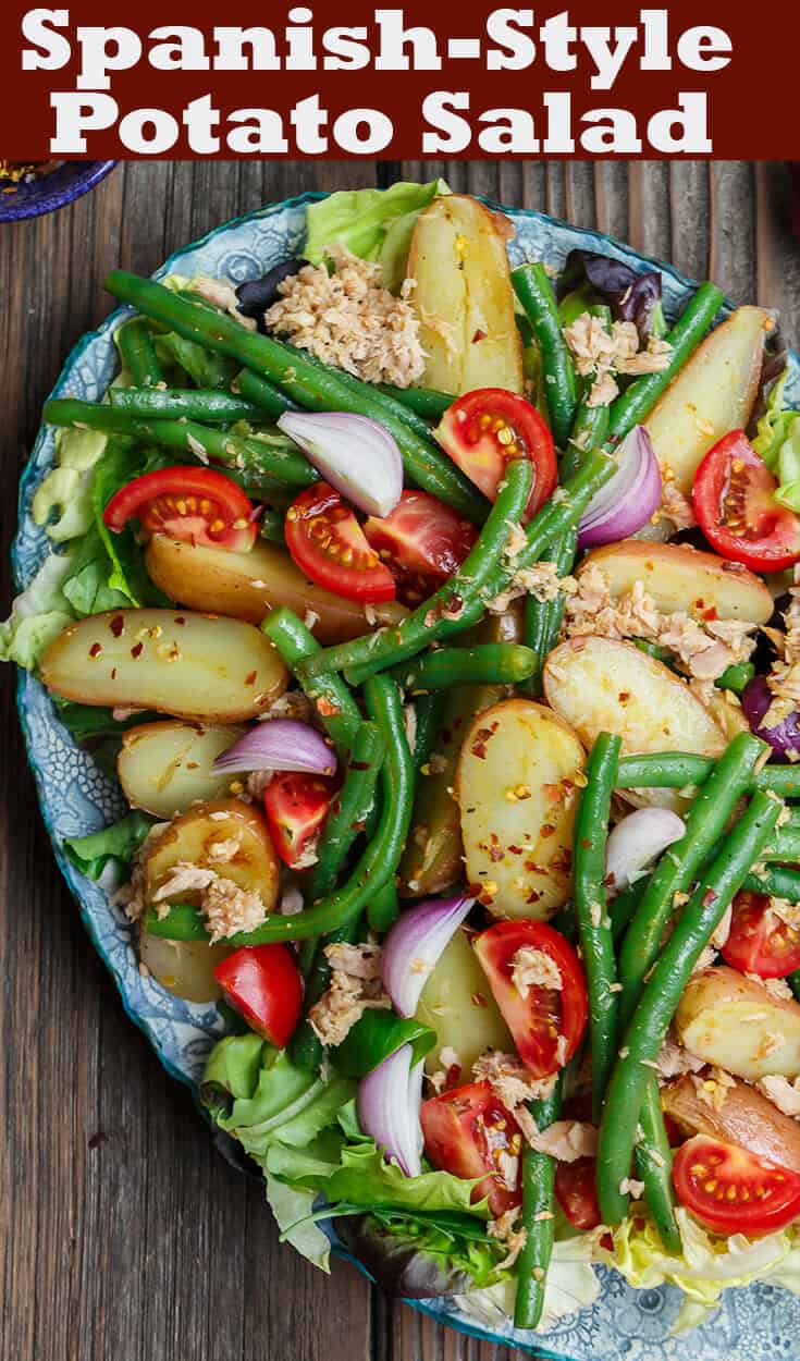 Spanish Potato Salad Recipe with Tuna | The Mediterranean Dish. Easy, tasty potato salad with tuna, green beans, and tomatoes. Lots of flavor from earthy spices and a simple Spanish-inspired dressing. Great as an appetizer or a light dinner. Recipe from TheMediterraneanDish.com #mediterraneandiet #mediterraneansalad #spanishsalad #potatosalad #glutenfree #tunasalad #healthyrecipes #greenbeans