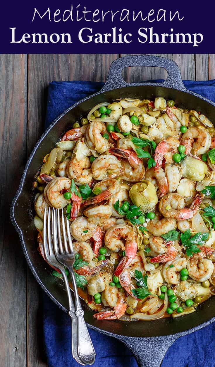 Easy garlic shrimp recipe with peas and artichokes! A quick and bright one-skillet meal. Be sure to see our suggestions for what to serve along. Recipe from TheMediterraneanDish.com #shrimp #glutenfree #mediterraneandiet