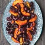 All-star fruit compote recipe | The Mediterranean Dish. Wine-poached peaches and cherries with a dollop of honeyed Greek yogurt. Serve it as part of brunch buffet or a light dessert.