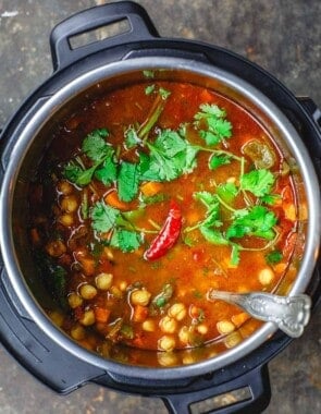 Easy Chickpea Instant Pot Soup | The Mediterranean Dish. Mediterranean style chickpea soup, with vegetables, fresh herbs, and great spices. You can make this in minutes in the Instant Pot, or see stovetop and slow cooker instructions. Great for make ahead and meal prep. #chickpeasoup #chickpearecipe #instantpotsoup #instantpotrecipe #instantpot #slowcooker #mediterraneandiet #veganrecipe #glutenfree #lowcarb