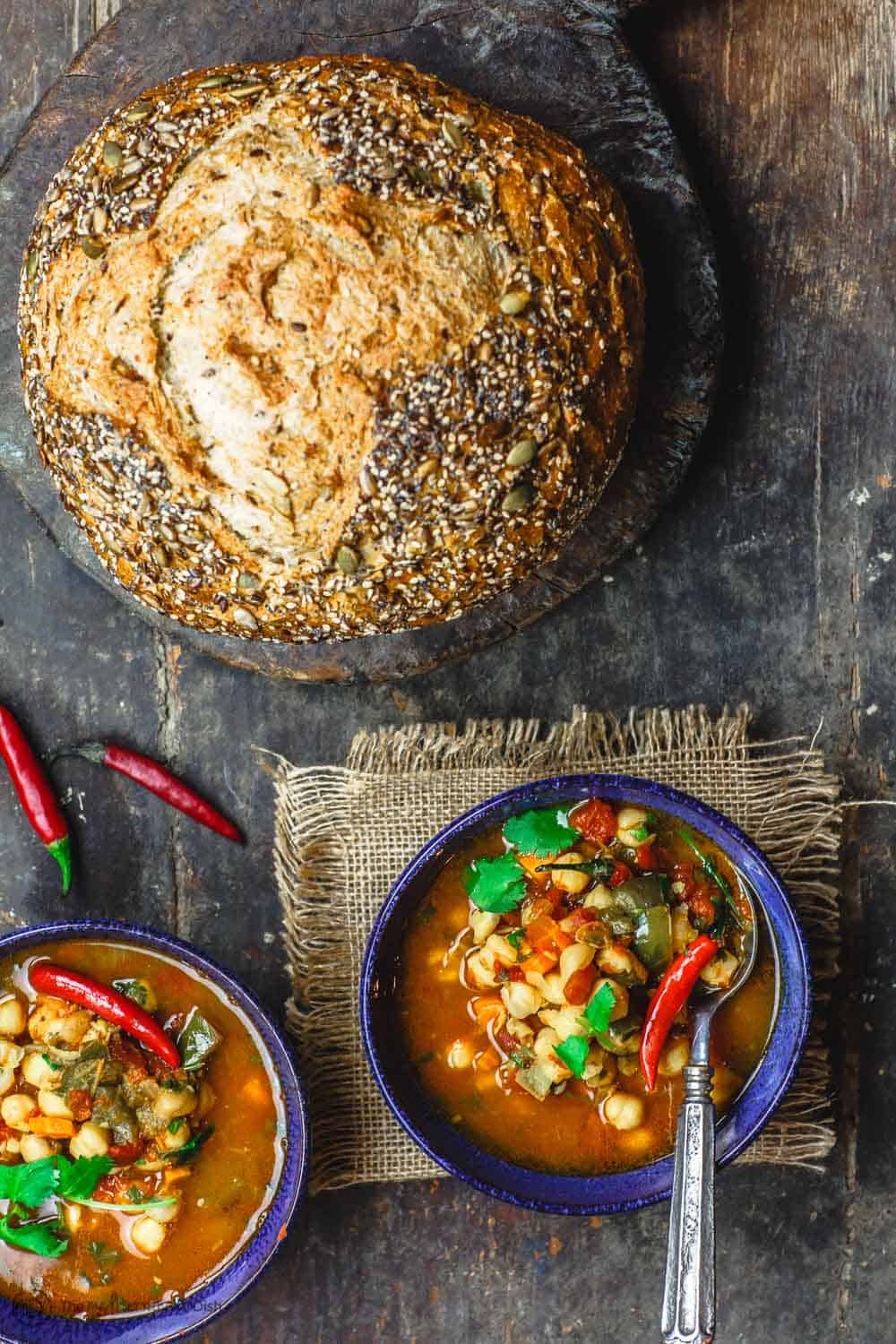 Easy Chickpea Instant Pot Soup | The Mediterranean Dish. Mediterranean style chickpea soup, with vegetables, fresh herbs, and great spices. You can make this in minutes in the Instant Pot, or see stovetop and slow cooker instructions. Great for make ahead and meal prep. #chickpeasoup #chickpearecipe #instantpotsoup #instantpotrecipe #instantpot #slowcooker #mediterraneandiet #veganrecipe #glutenfree #lowcarb