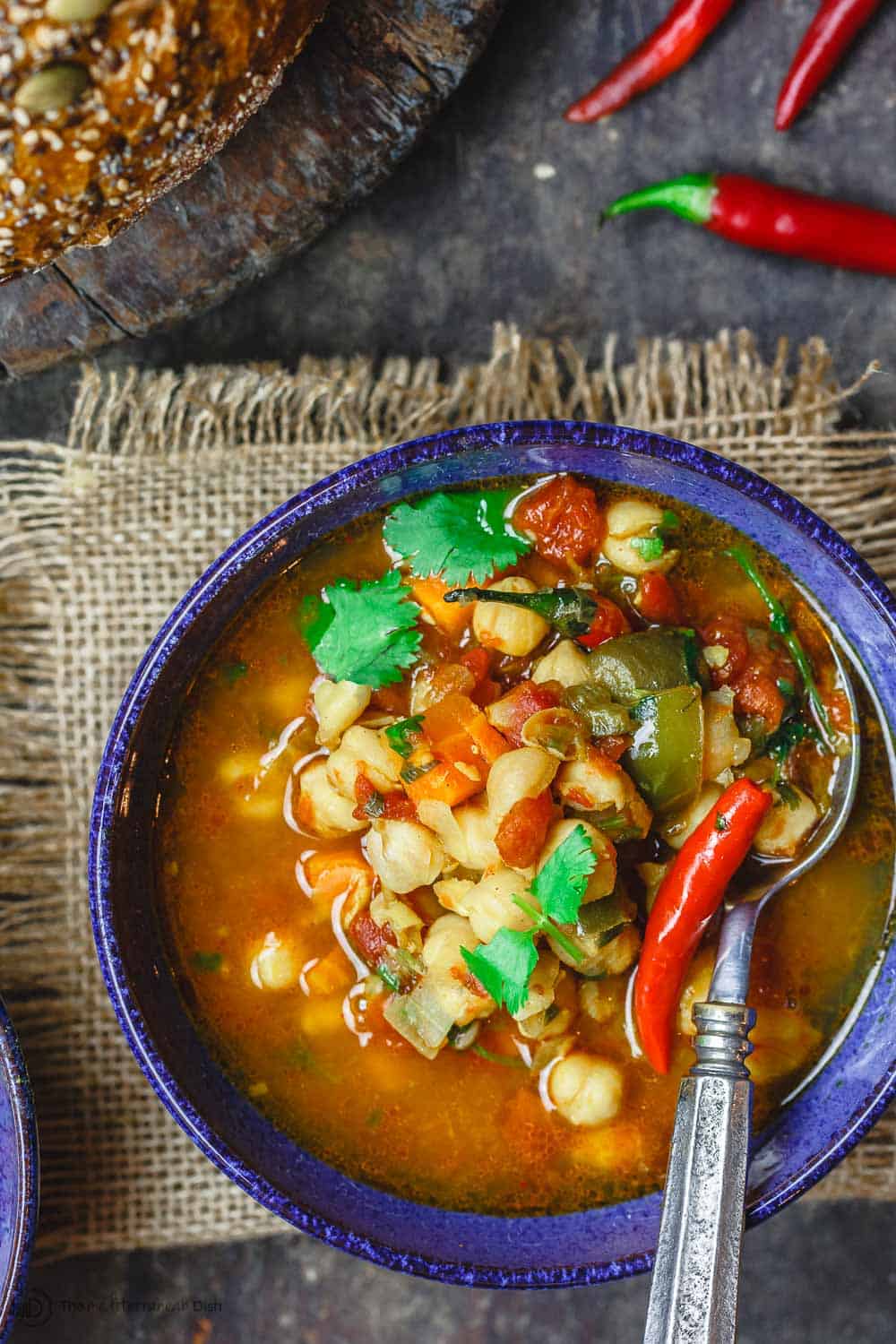 Easy Chickpea Instant Pot Soup | The Mediterranean Dish. Mediterranean style chickpea soup, with vegetables, fresh herbs, and great spices. You can make this in minutes in the Instant Pot, or see stovetop and slow cooker instructions. Great for make ahead and meal prep. #chickpeasoup #chickpearecipe #instantpotsoup #instantpotrecipe #instantpot #slowcooker #mediterraneandiet #veganrecipe #glutenfree #lowcarb