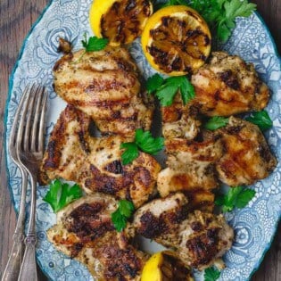 Lemon Chicken, served with grilled lemons