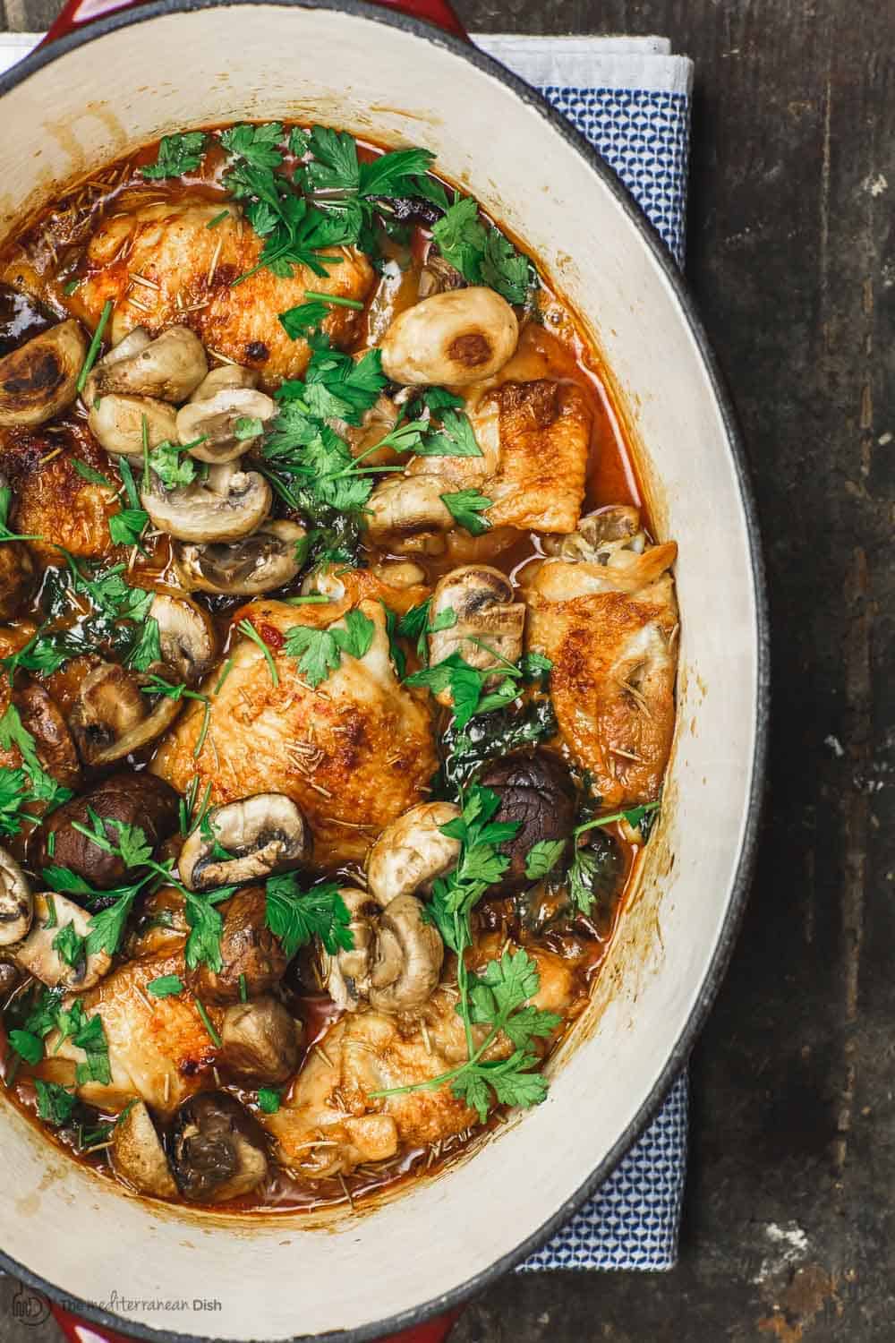 Wine Braised Chicken Thighs with a Mediterranean Rosemary spice rub, mushrooms, and shallots