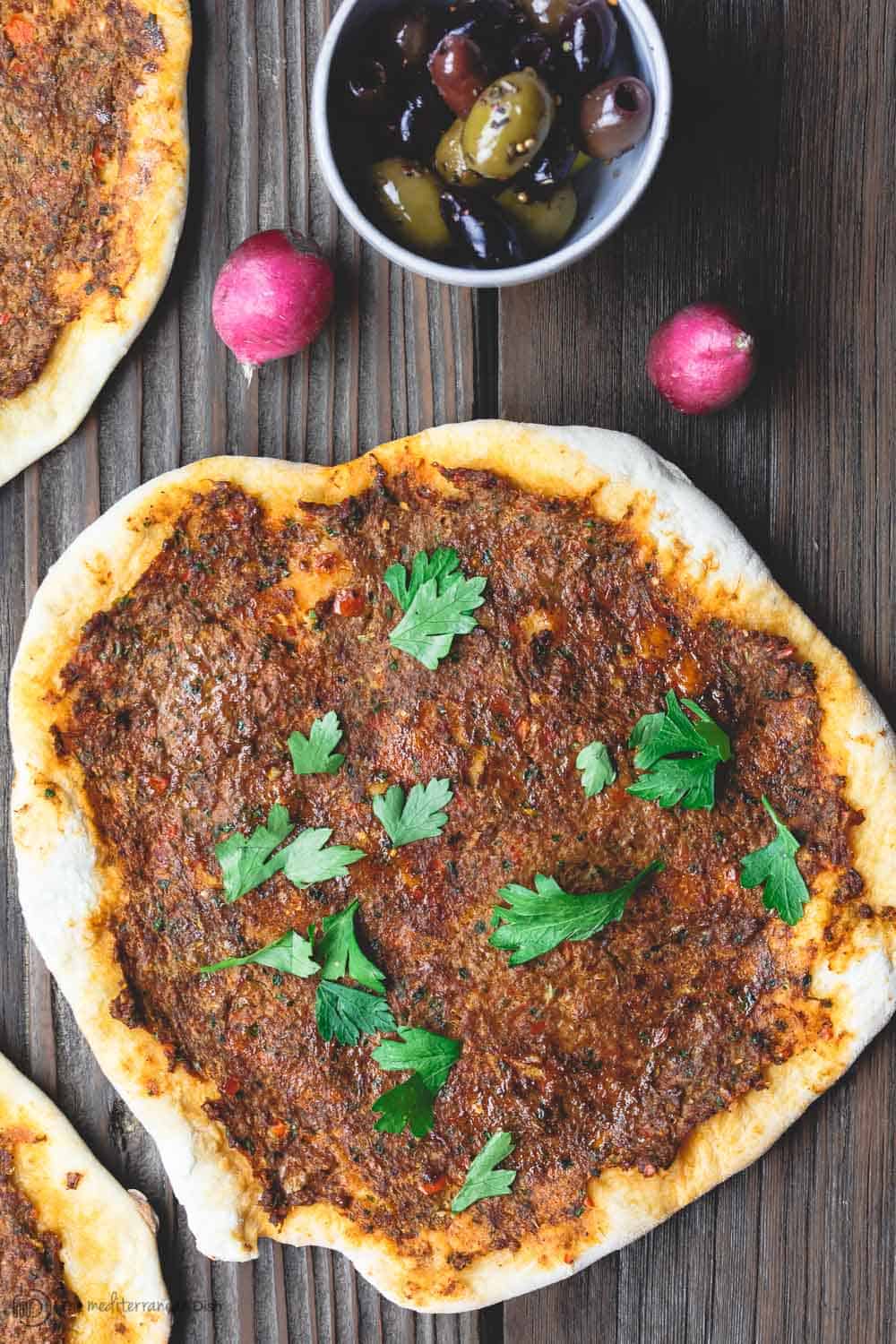 Turkish Lahmacun (Lamajoun). Flatbread with meat topping.