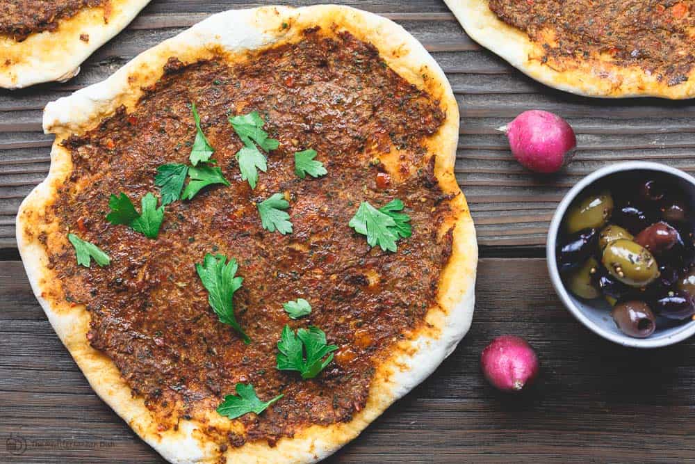 Turkish Lahamcun (Lahmajoun). Like a pizza with thin crust and a meat topping