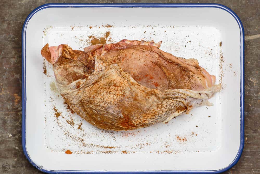 One half turkey breast seasoned with allspice, paprika, and nutmeg