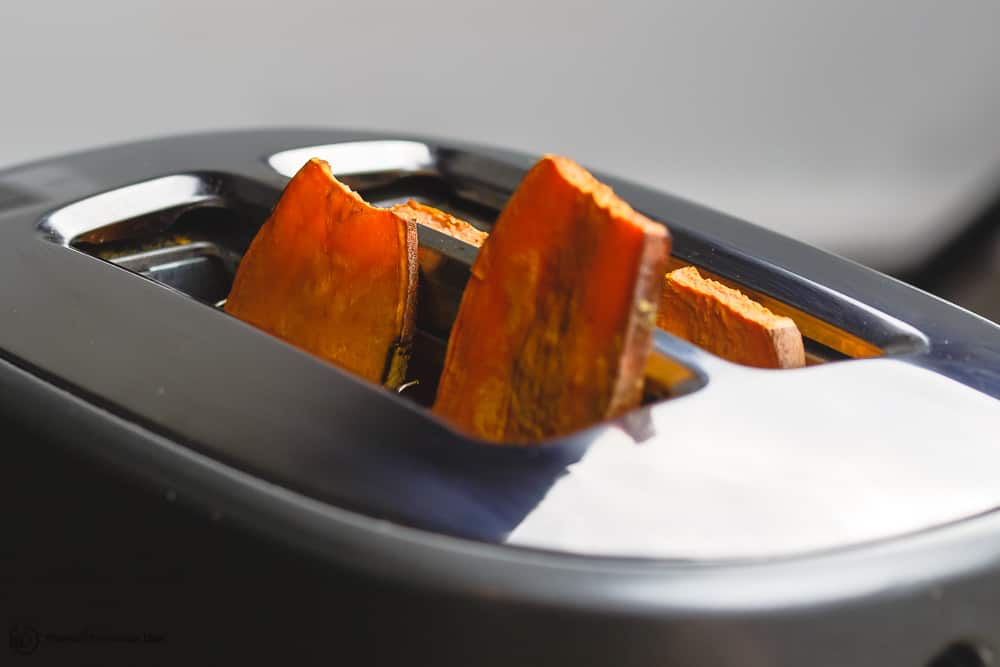 Warm up sweet potato toast in toaster