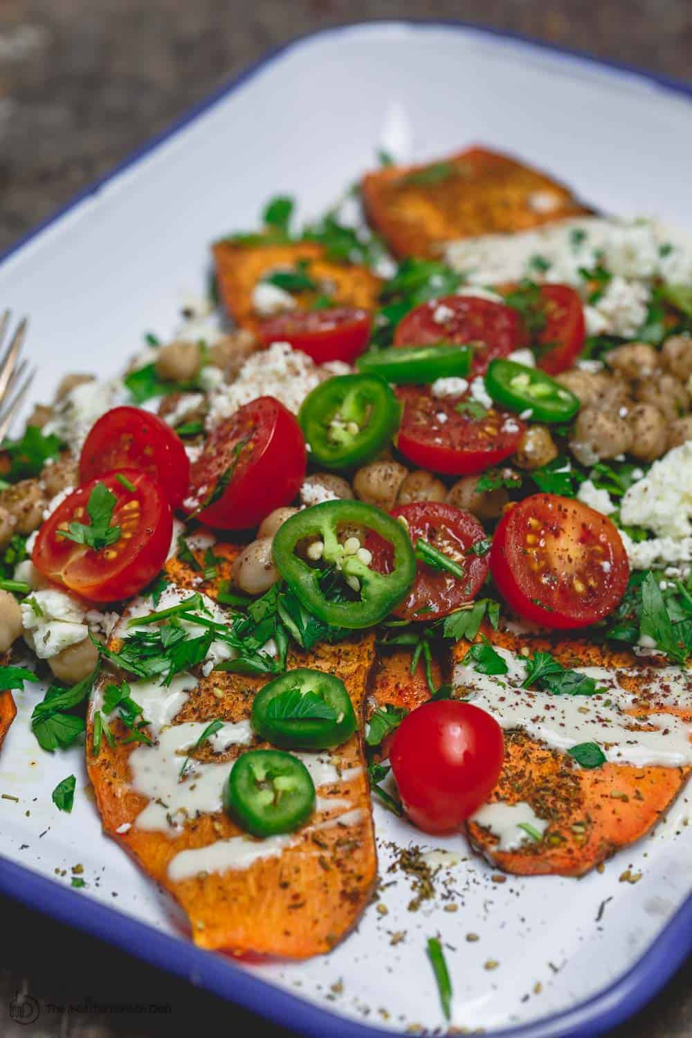 Sweet Potato Toast with za'atar spice and Mediterranean toppings