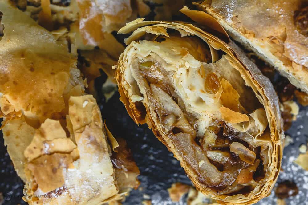 Side shot of phyllo apple strudel showing apple filling