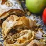 Easy Apple Strudel Recipe with Phyllo Dough | The Mediterranean Dish. Homemade apple filling rolled in phyllo dough makes a tasty, light, and extra crispy apple strudel. See the recipe on themediterraneandish.com #apple #appledessert #applesturdel #phyllorecipe #phyllodessert #applepie