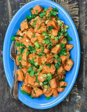 Simple Boiled Sweet Potatoes, tossed with fresh herbs, garlic, scallions and extra virgin olive oil