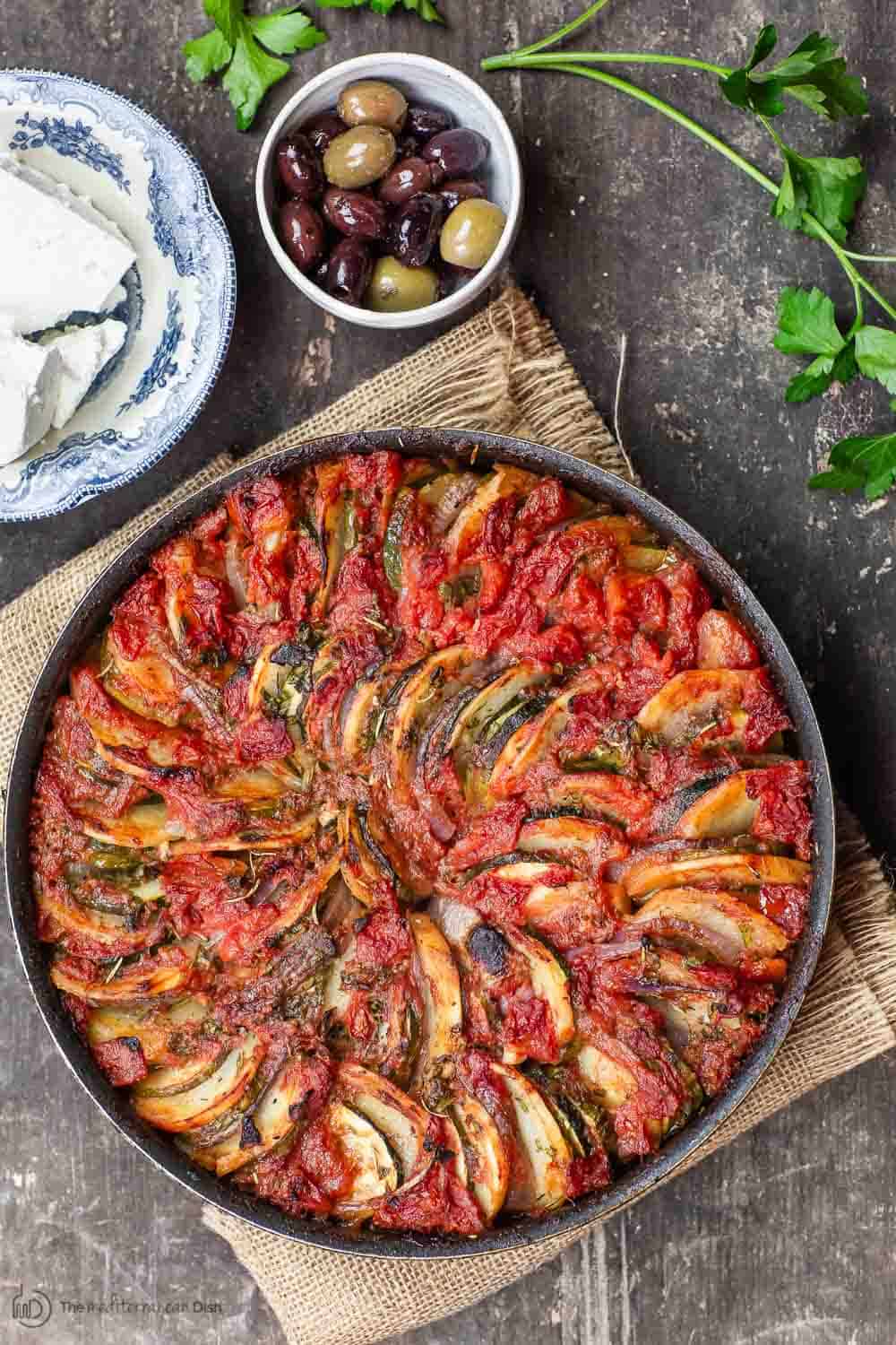 Briam Greek Roasted Vegetables served with a side of feta and olives