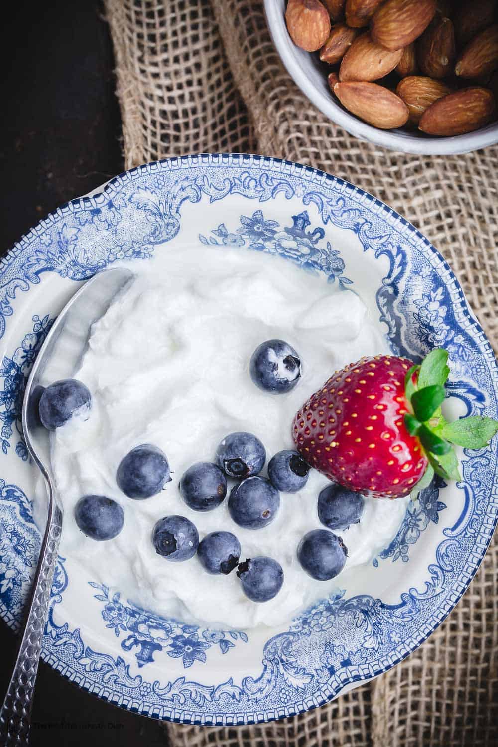 Greek yogurt with fresh blue berries and strawberry for a Mediterranean diet snack