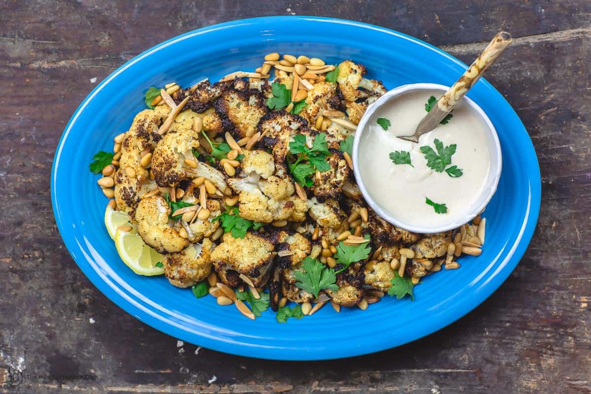 Roasted Cauliflower on Serving Platter with tahini