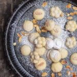 Egyptian Ghorybeh Butter Cookies with Powdered Sugar and Almonds on top