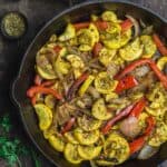 Mediterranean Sauteed Yellow Squash with Sweet Onions, Bell Peppers and Garlic in Cast Iron Skillet