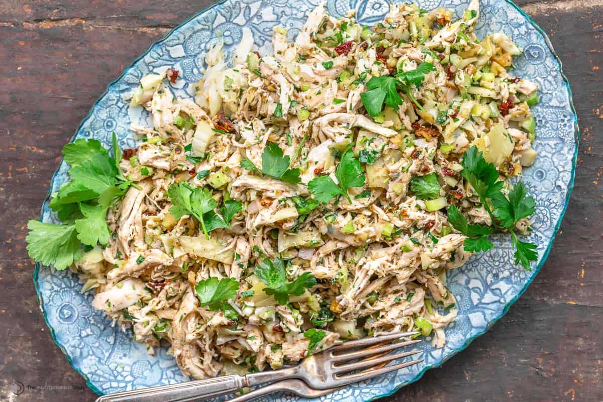 healthy chicken salad served on blue platter