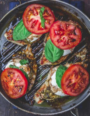 Easy Caprese Chicken with basil pesto, fresh mozzarella, ripe tomatoes, and balsamic glaze