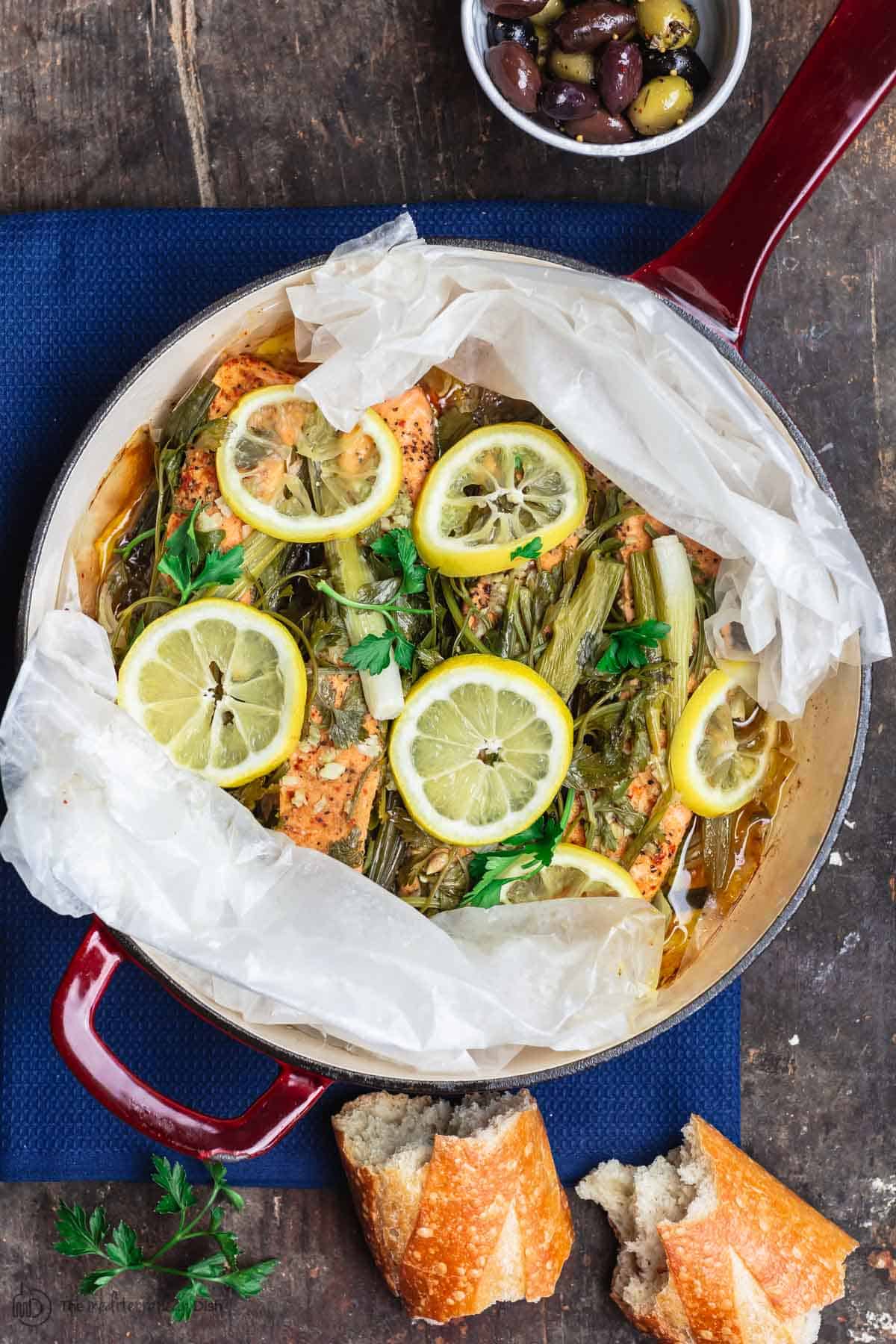 Steamed salmon with a side of fresh crusty bread