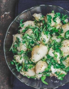 Simple boiled potatoes, tossed with garlic, fresh herbs and extra virgin olive oil