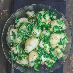 boiled potatoes tossed with garlic, fresh herbs and extra virgin olive oil