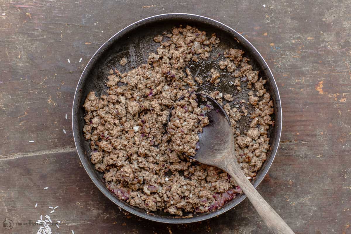 Cooked ground beef for greek stuffed tomatoes