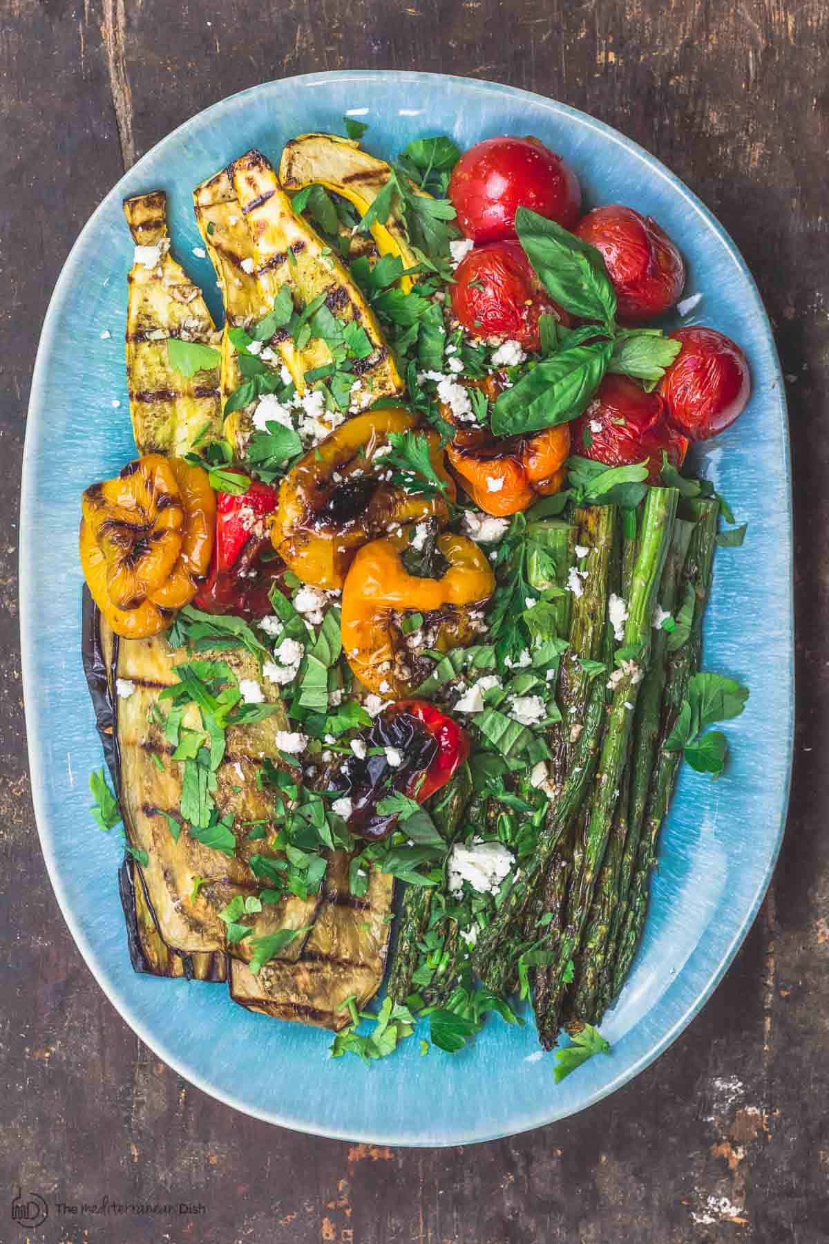 Grilled Vegetables. Eggplant, asparagus, squash, tomatoes, and bell peppers.