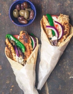 Chicken gyros wraps served with black and green olives