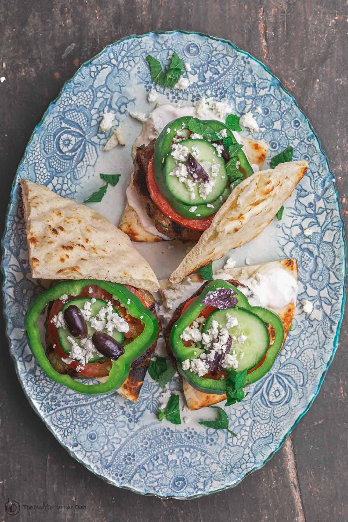 Grilled Greek lamb burgers served on a plate