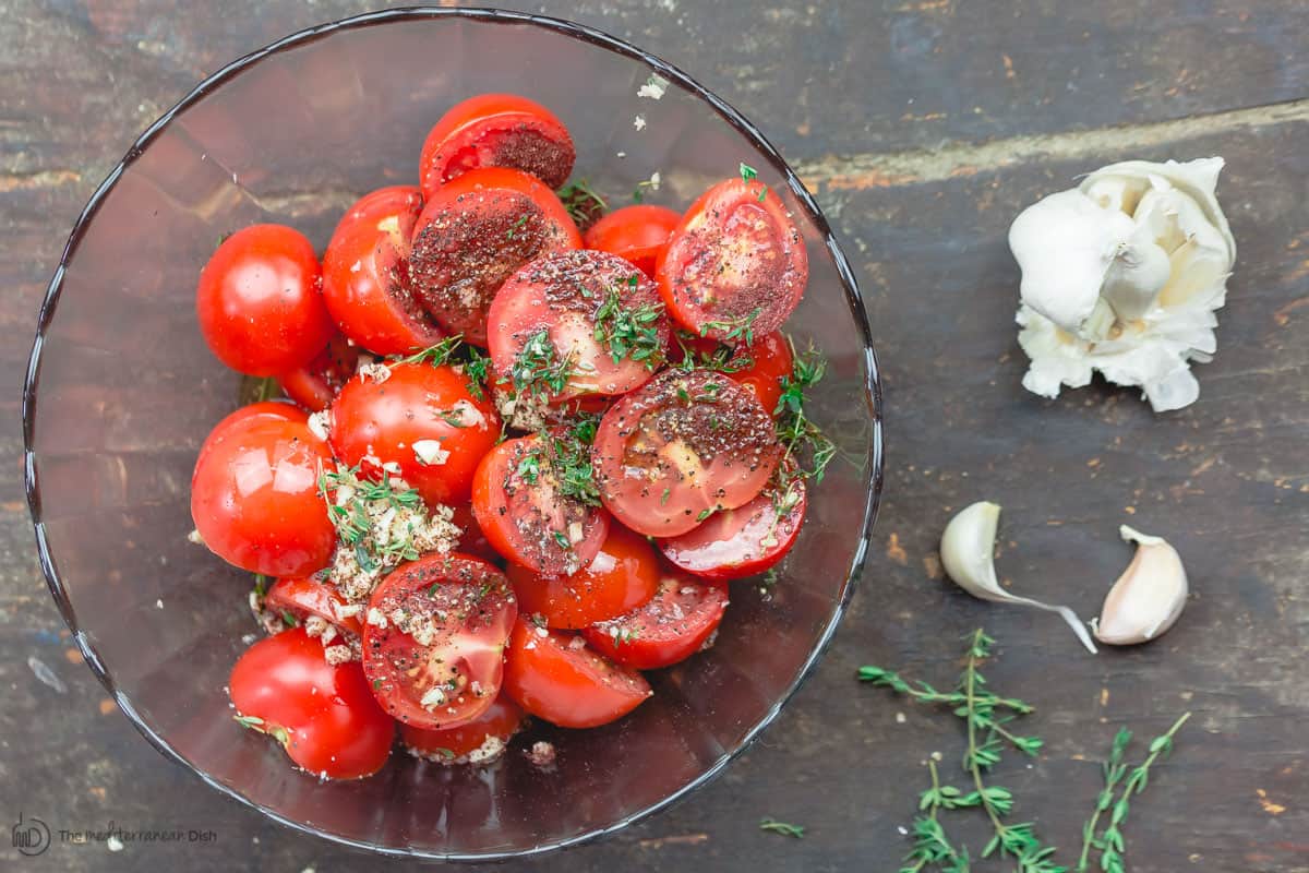 Campari Tomatoes halved and seasoned and placed in mixing bowl