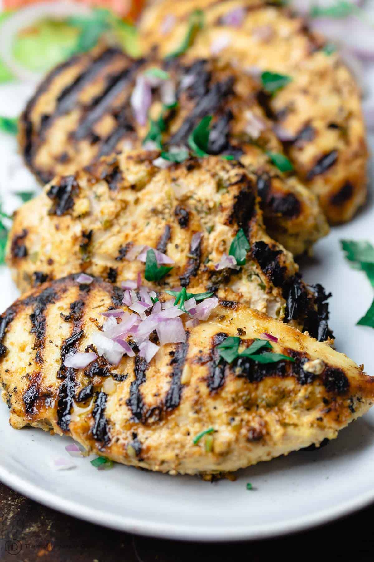 Grilled chicken breast on plate