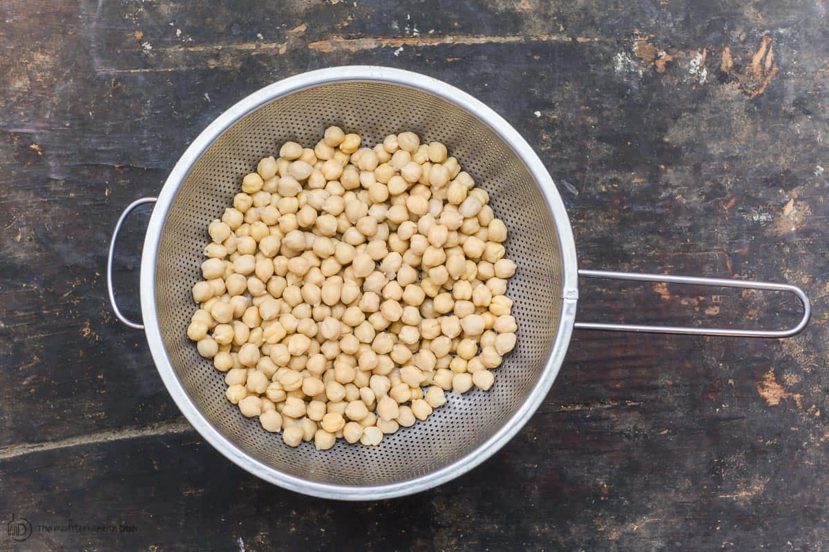Chickpeas placed in a strainer