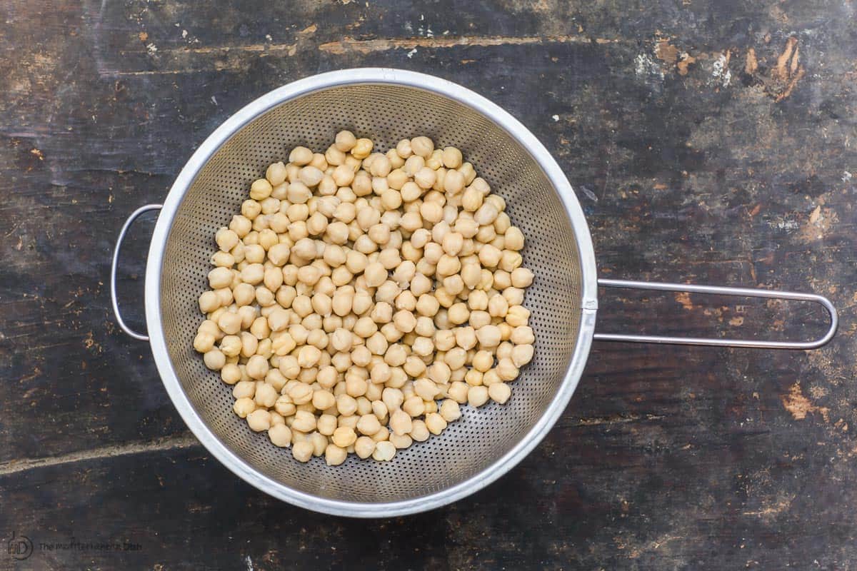 Chickpeas placed in a strainer