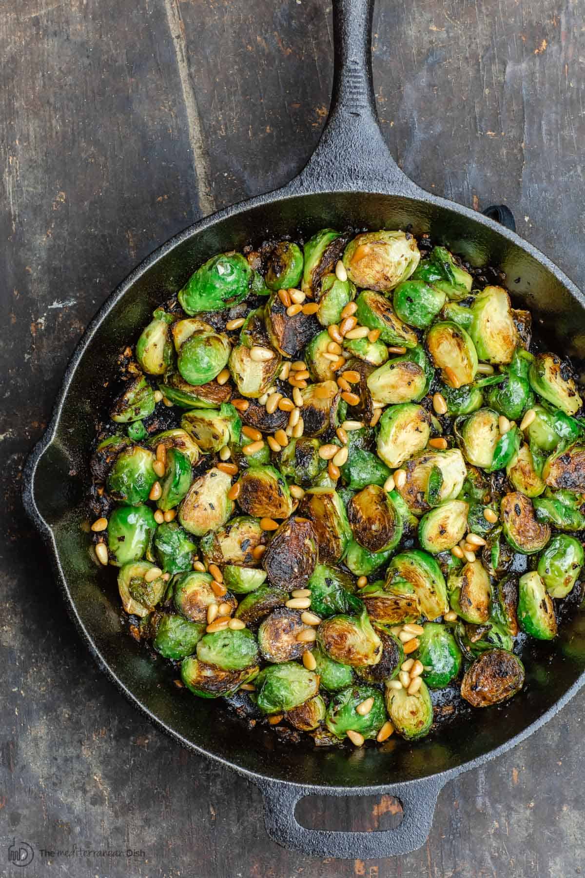 Brussel sprouts in a cast iron frying pan