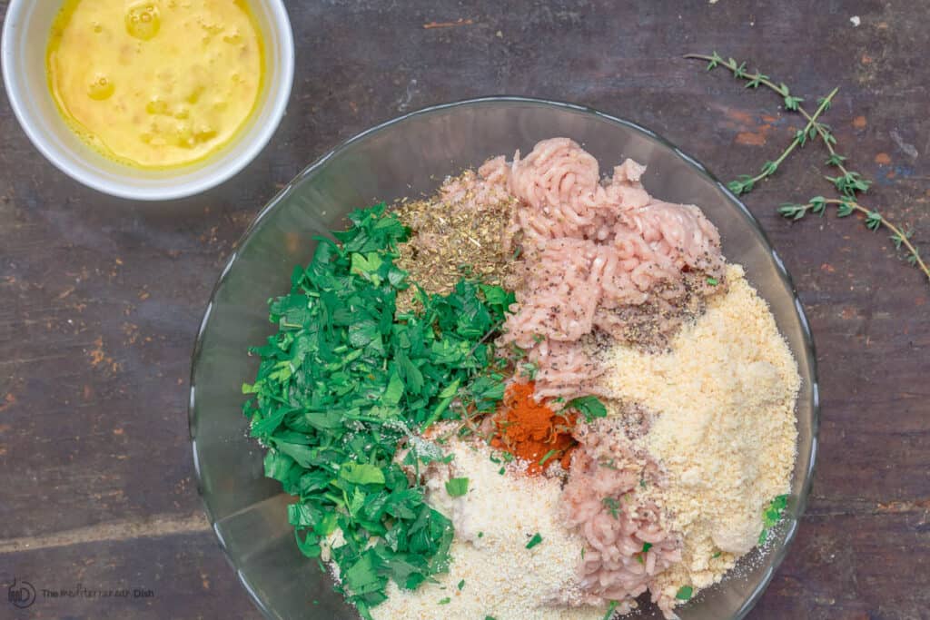 Chicken meatball mix prepared in mixing bowl