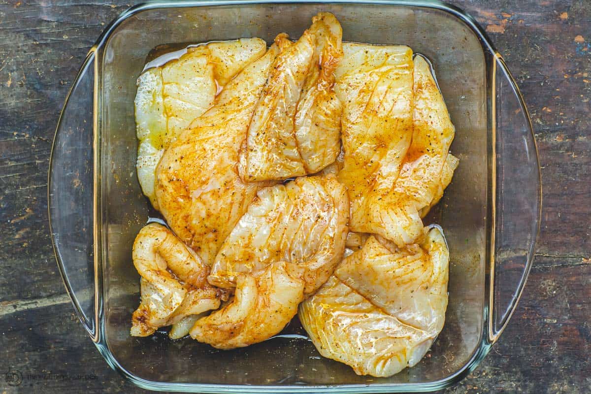 Cod fish seasoned and prepared in baking dish